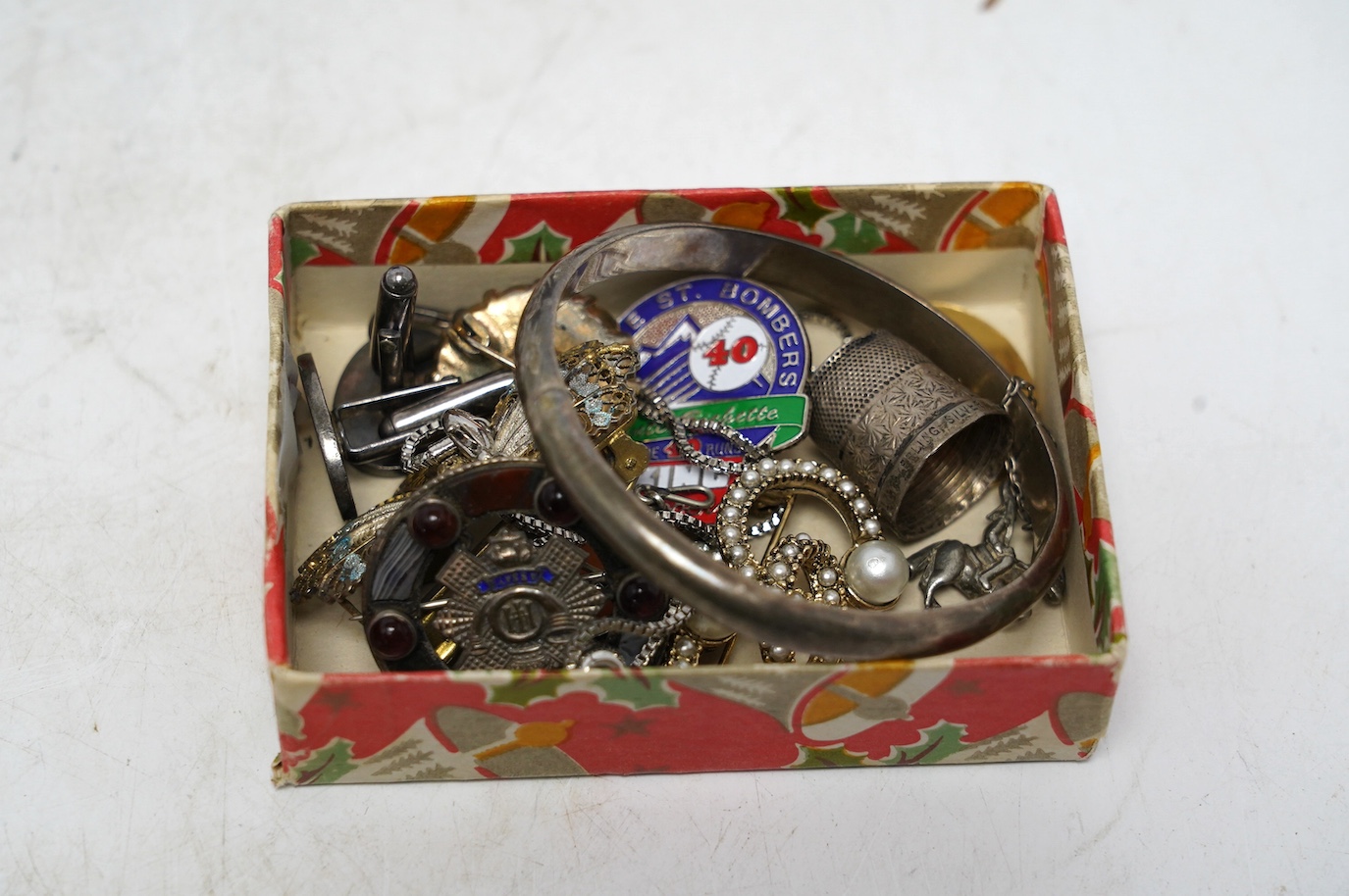 A cased set of six silver apostle coffee spoons and a small quantity of assorted mainly costume jewellery. Condition - poor to fair